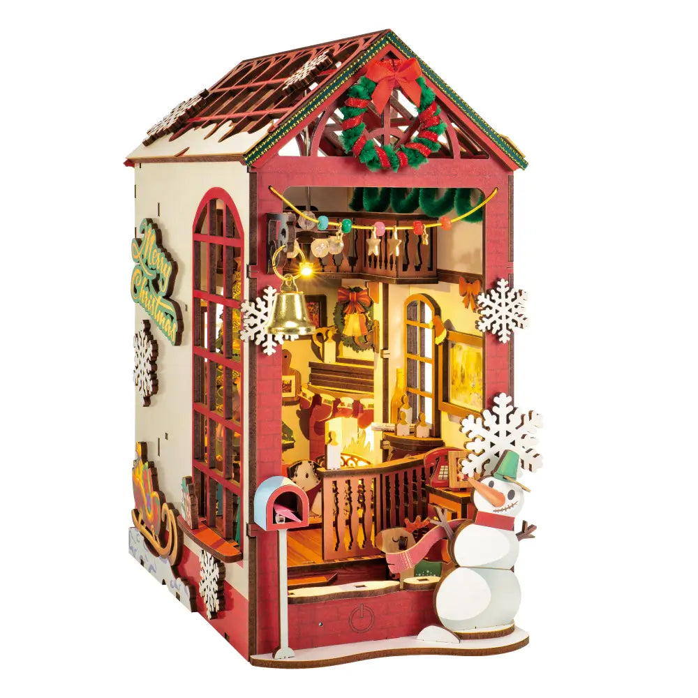 Puzzle 3D Magia Crăciunului Rolife, dioramă pentru bibliotecă din lemn, vedere laterală cu om de zăpadă, coroniță și interior luminat, 206 piese